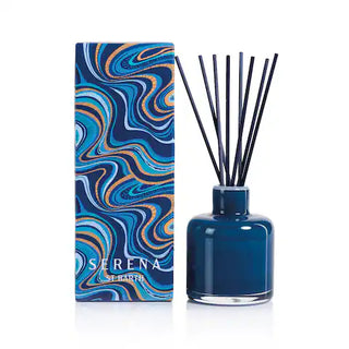 Blue diffuser bottle with black sticks mango citrus scents