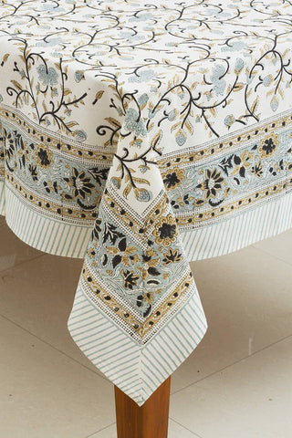 Decorative block print tablecloth with floral patterns and border