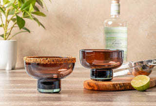Two tamarind colored modern margarita mezcal glasses