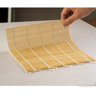 Bamboo sushi rolling mat helps you make sushi at home