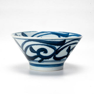 Blue and white ceramic bowl with intricate patterns