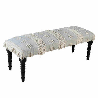 Decorative bench with patterned cushion and wooden legs on a white background