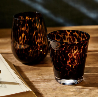 Choose from the Tortoise print stemless glass or rocks glass