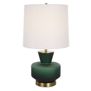 Green table lamp with a white shade and gold accents