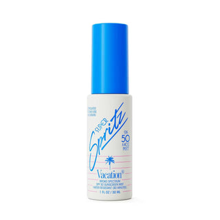 Super Spritz Vacation sunscreen mist bottle with blue cap on a white background