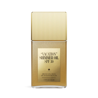 Gold bottle of 'Vacation Shimmer Oil SPF 30' 