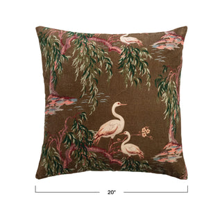 A square throw pillow with a classic tapestry-style toile pattern featuring white cranes on a brown background with green and pink foliage, shown on a white background with a 20-inch width dimension overlay.