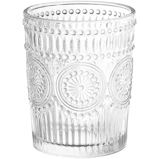 A clear vintage-inspired rocks glass with pressed glass patterns.