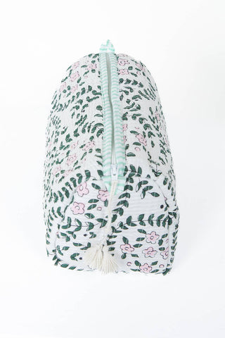 A white fabric pouch or cover decorated with a green leaf and pink floral pattern, featuring a mint green striped zipper and a white tassel at the bottom, shown against a plain white background.