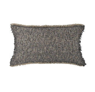 A rectangular throw pillow with a textured, heathered knit pattern in shades of gray and beige, finished with fringed edges, shown against a plain white background.