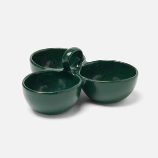 Three small dark green ceramic bowls with a central handle, arranged in a cluster on a light gray background.