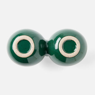 A glossy dark green ceramic two-bulb vase with a contrasting light beige ring around the base of each bulb, shown on a clean white background.