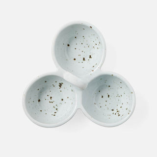 A three-compartment ceramic serving dish with a light blue-gray glaze and dark brown speckles, shown from a top-down view on a white background.