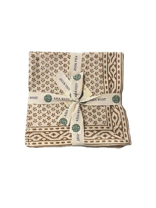 mustard blossom print napkin folded up