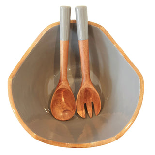 Wooden spoon and fork with gray handles in a ceramic bowl on a white background